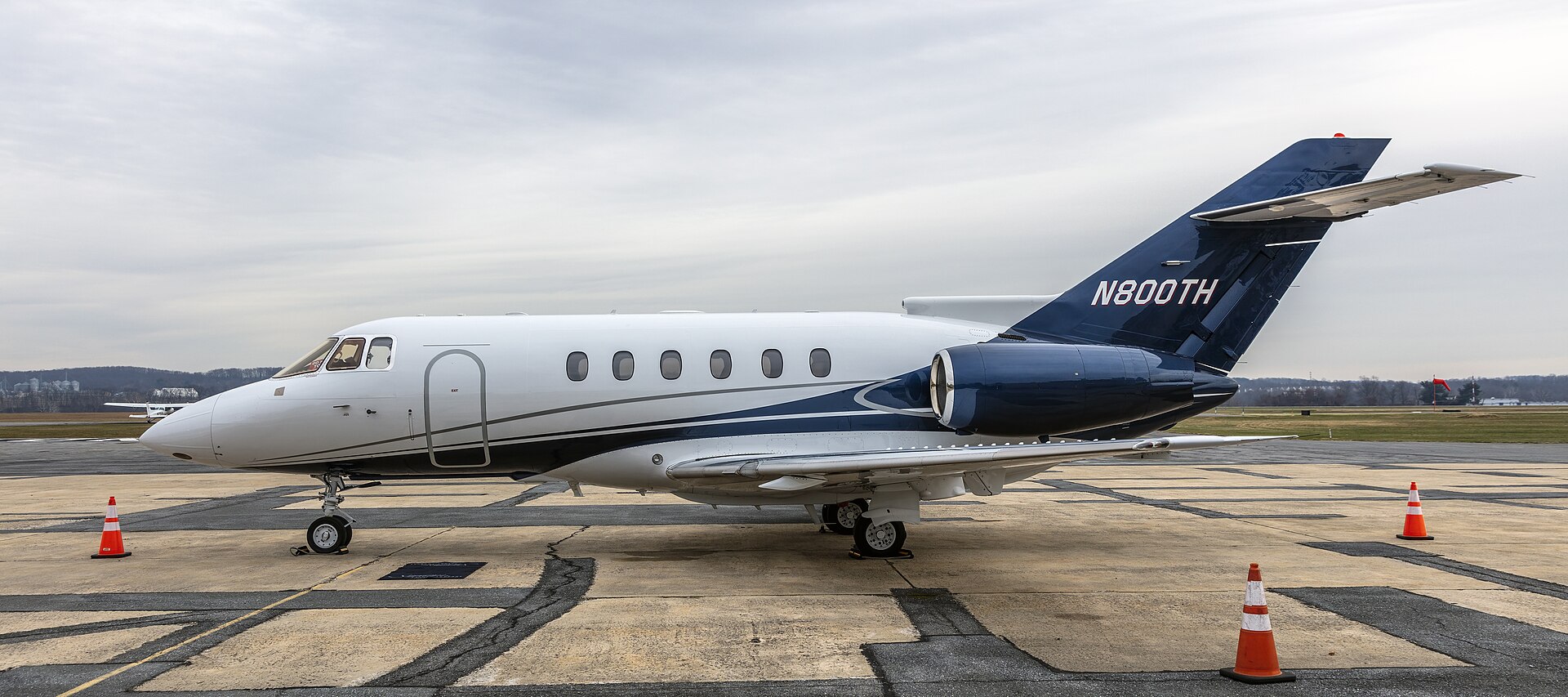 Hawker 800XP midsize business jet parked on the ramp