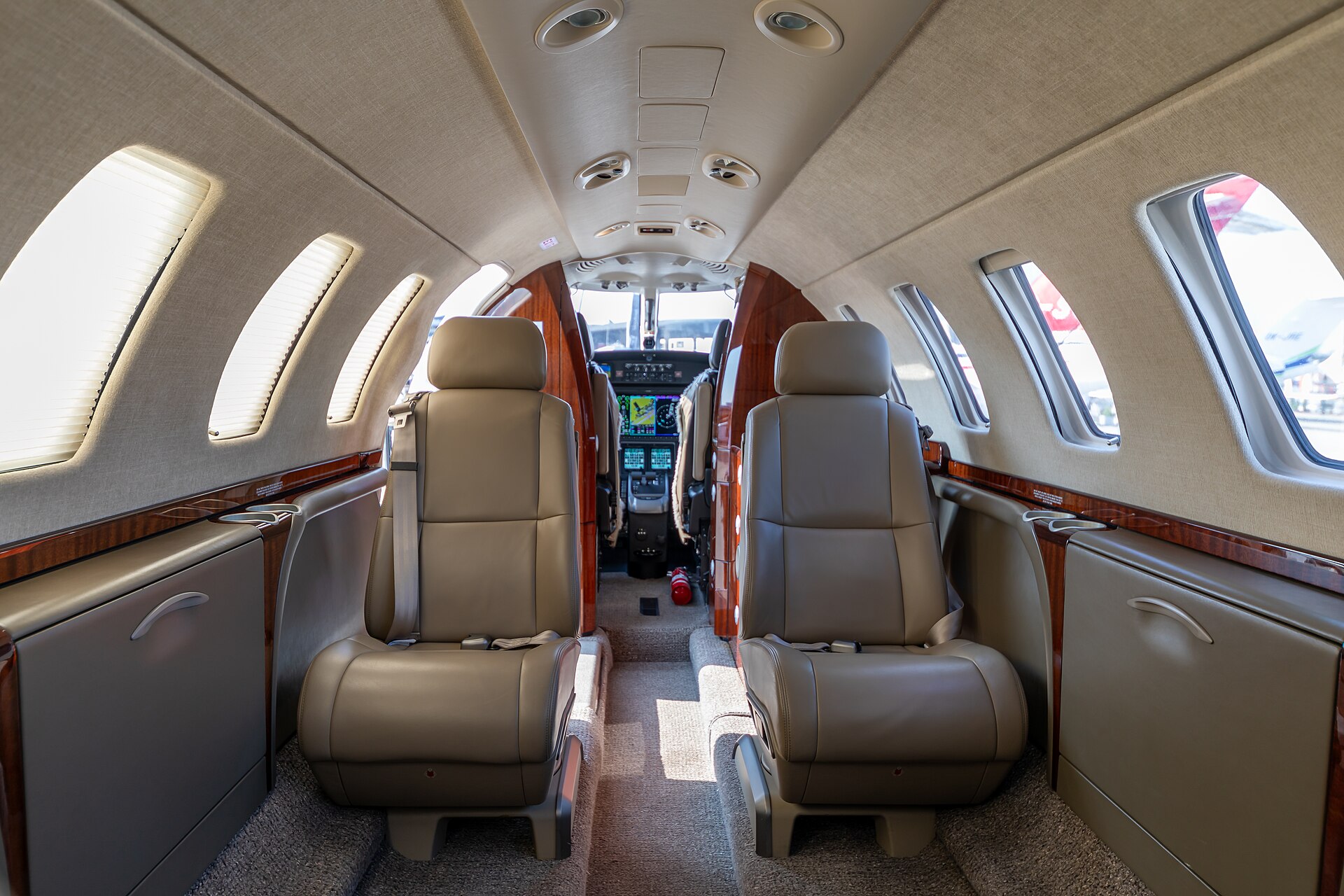Cabin of a Cessna Citation CJ3+ light jet with facing club seats, on static display