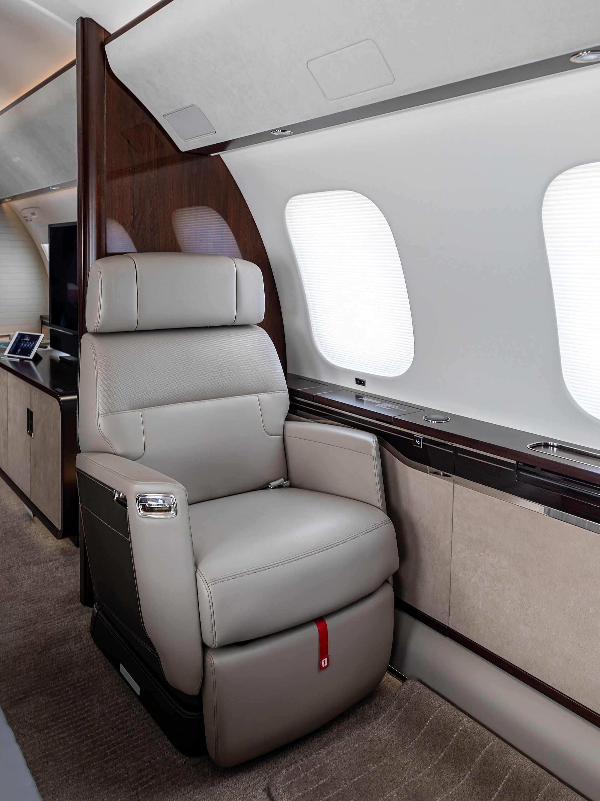 Cabin of a Bombardier Global 7500 with club seating on static display