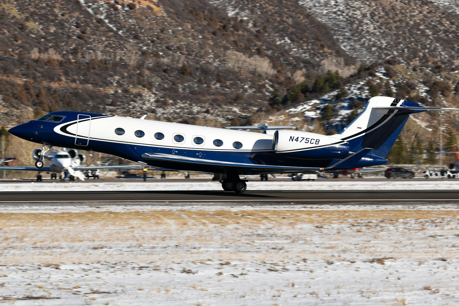 Large-cabin business jet on a snowy runway