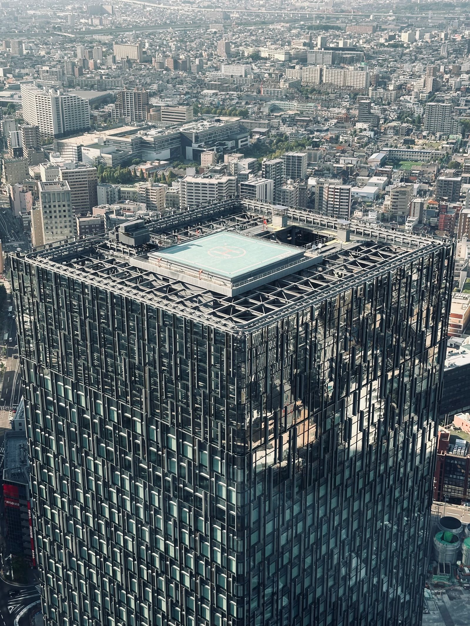 Helicopter landing pad on the rooftop of a skyscraper
