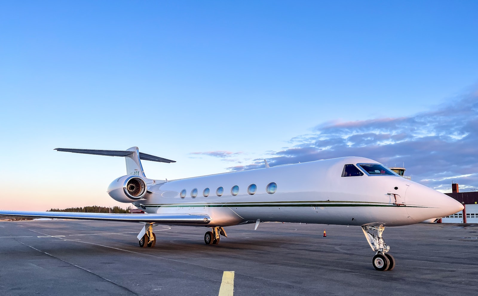 Business jet on the tarmac with boarding stairs